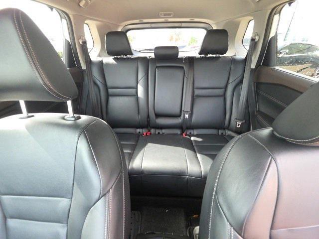 Photo of 2023 Pearl White Tricoat Nissan Rogue