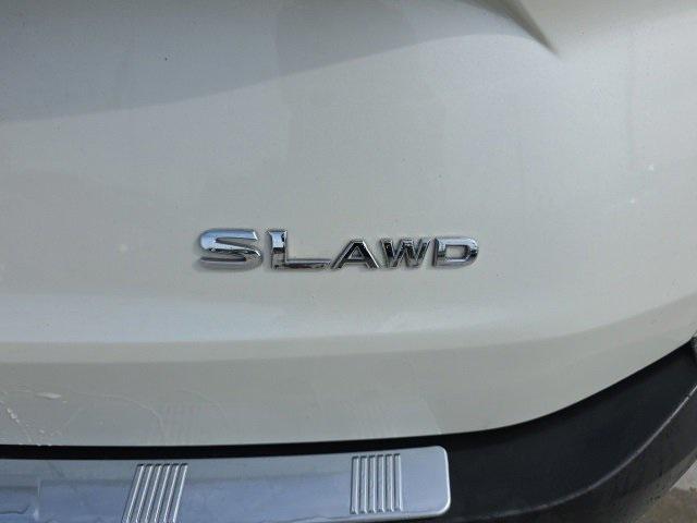 Photo of 2023 Pearl White Tricoat Nissan Rogue