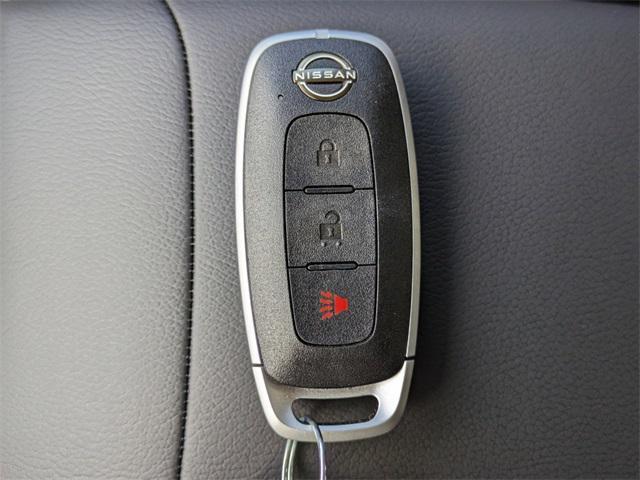 Photo of 2025 Scarlet Ember Tintcoat Nissan Kicks