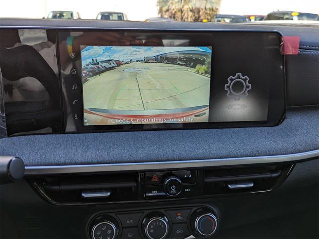 Photo of 2025 Scarlet Ember Tintcoat Nissan Kicks