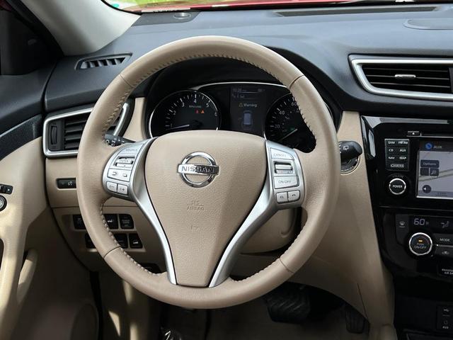 Photo of 2015 Cayenne Red Nissan Rogue