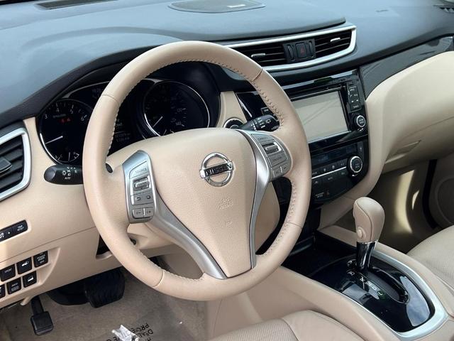 Photo of 2015 Cayenne Red Nissan Rogue