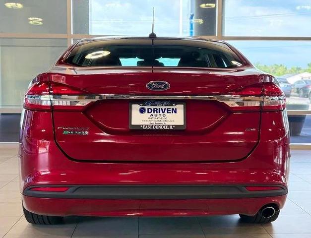 Photo of 2017 Ruby Red Metallic Tinted Clearcoat Ford Fusion Energi