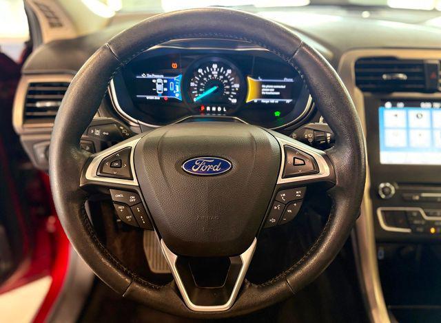 Photo of 2017 Ruby Red Metallic Tinted Clearcoat Ford Fusion Energi