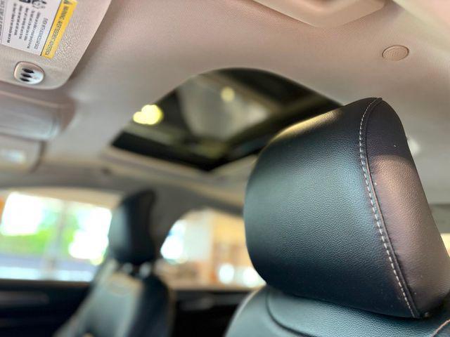 Photo of 2017 Ruby Red Metallic Tinted Clearcoat Ford Fusion Energi