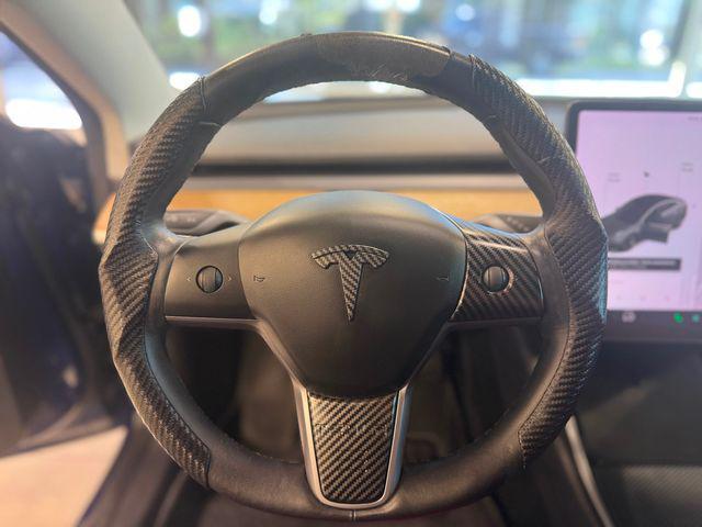 Photo of 2019 Deep Blue Metallic Tesla Model 3