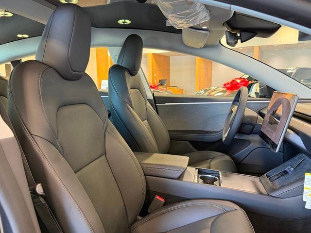Photo of 2025 Stealth Grey Tesla Model 3