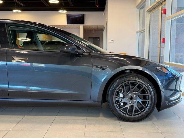 Photo of 2025 Stealth Grey Tesla Model 3