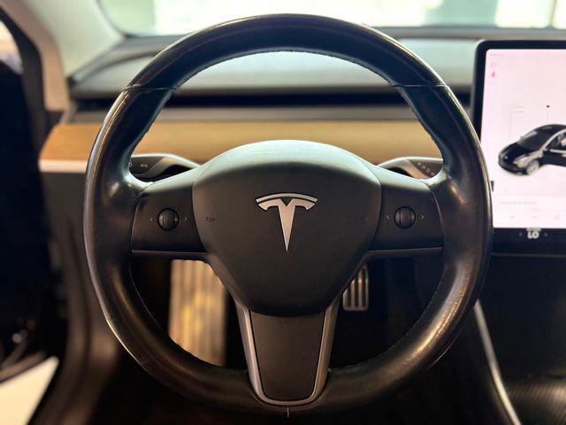 Photo of 2019 Solid Black Tesla Model 3