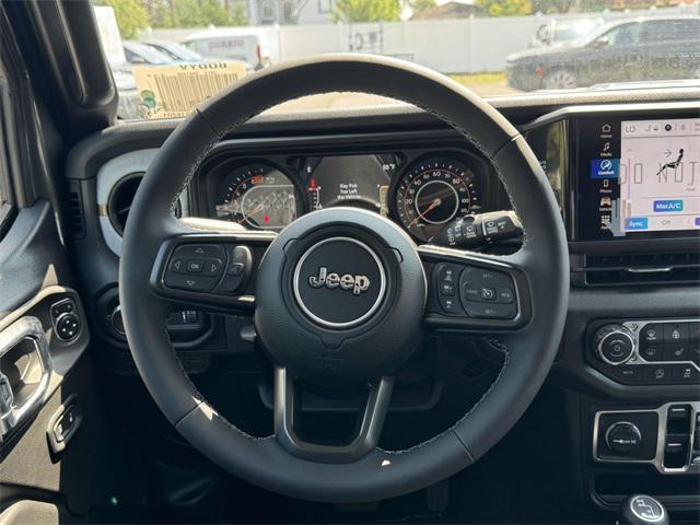 Photo of 2025 Granite Crystal Metallic Clearcoat Jeep Wrangler