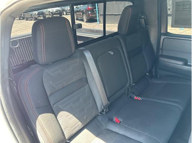 Photo of 2022 Glacier White Nissan Frontier