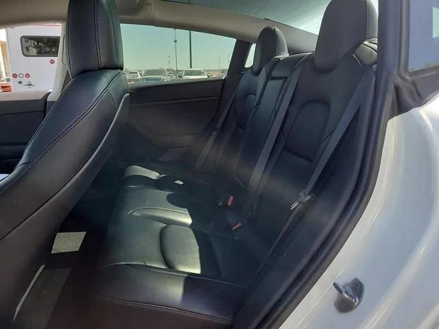 Photo of 2021 Pearl White Multi Tesla Model 3