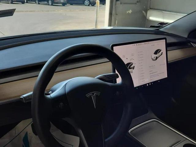 Photo of 2021 Pearl White Multi Tesla Model 3