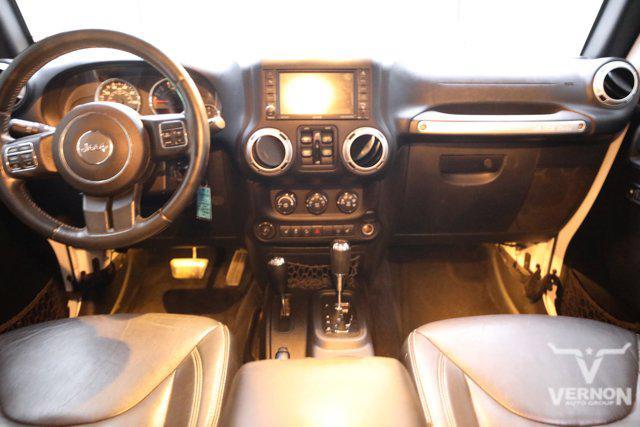 Photo of 2015 Bright White Clearcoat Jeep Wrangler Unlimited