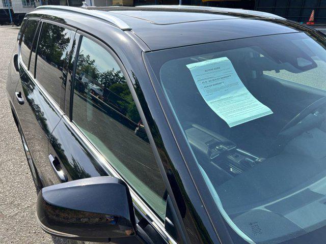 Photo of 2024 Midnight Black Toyota Grand Highlander