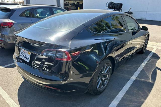Photo of 2021 Solid Black Tesla Model 3