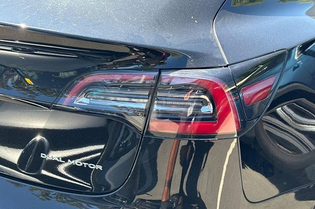 Photo of 2021 Solid Black Tesla Model 3