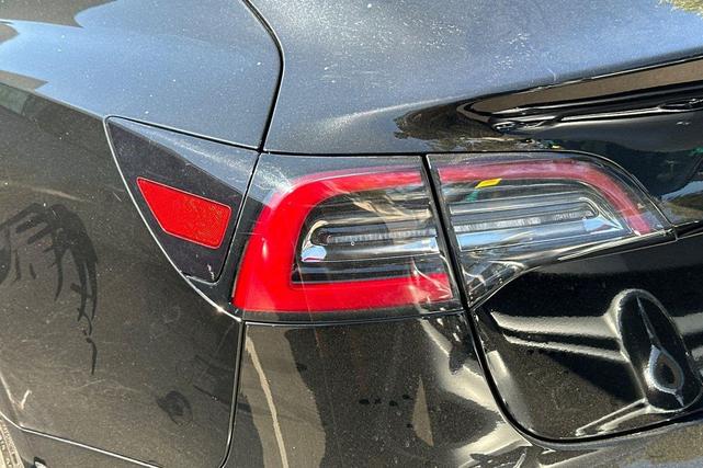 Photo of 2021 Solid Black Tesla Model 3