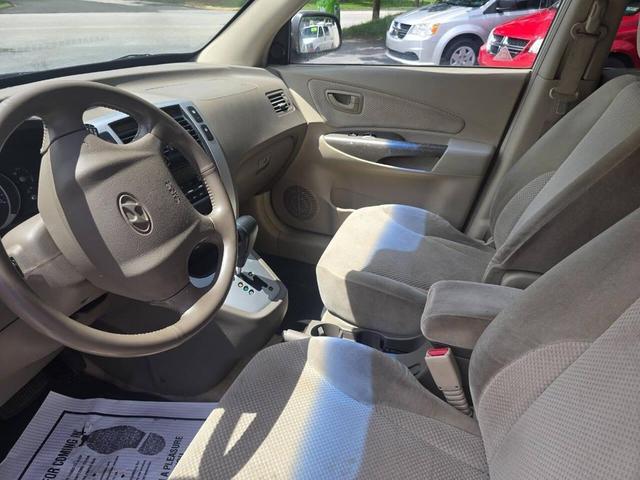 Photo of 2006 Platinum Green Hyundai TUCSON