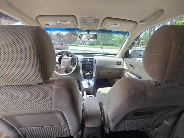 Photo of 2006 Platinum Green Hyundai TUCSON