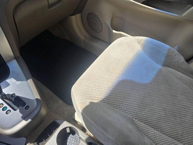 Photo of 2006 Platinum Green Hyundai TUCSON