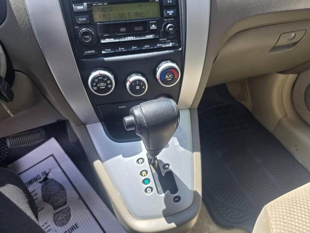 Photo of 2006 Platinum Green Hyundai TUCSON