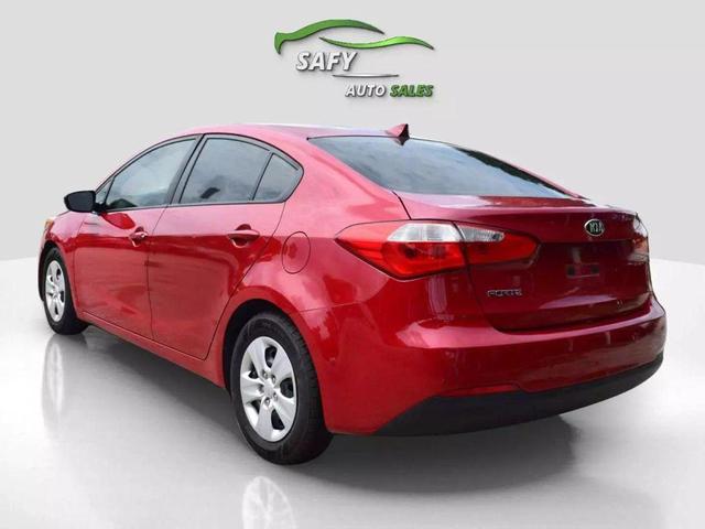 Photo of 2016 Crimson Red Metallic Kia Forte