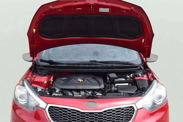 Photo of 2016 Crimson Red Metallic Kia Forte