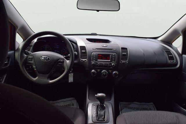 Photo of 2016 Crimson Red Metallic Kia Forte