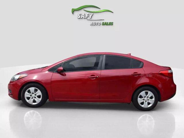 Photo of 2016 Crimson Red Metallic Kia Forte