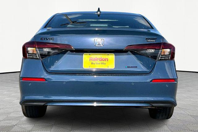 Photo of 2026 Blue Lagoon Honda Civic Hybrid