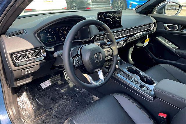 Photo of 2026 Blue Lagoon Honda Civic Hybrid