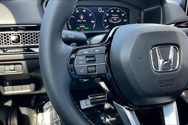 Photo of 2026 Blue Lagoon Honda Civic Hybrid