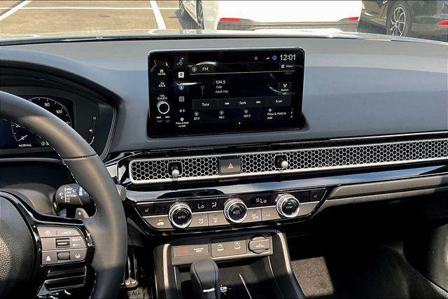 Photo of 2026 Blue Lagoon Honda Civic Hybrid