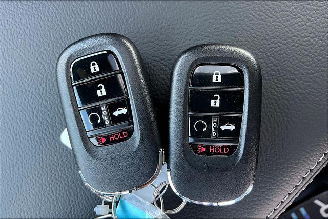 Photo of 2026 Blue Lagoon Honda Civic Hybrid