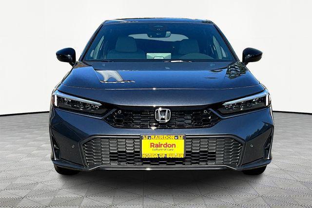 Photo of 2026 Gold Honda Civic Hybrid