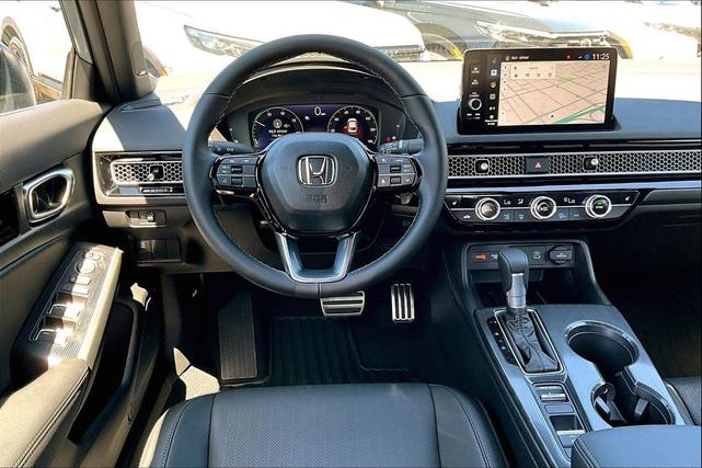 Photo of 2025 Urban Gray Pearl Honda Civic Hybrid