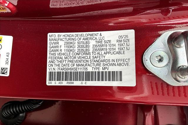 Photo of 2025 Radiant Red Metallic Honda CR-V Hybrid