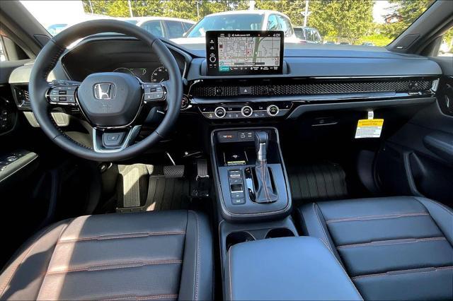 Photo of 2025 Radiant Red Metallic Honda CR-V Hybrid