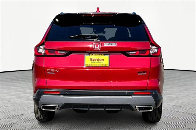 Photo of 2025 Radiant Red Metallic Honda CR-V Hybrid