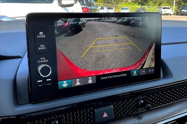 Photo of 2025 Radiant Red Metallic Honda CR-V Hybrid