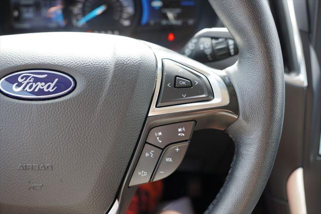 Photo of 2024 Agate Black Metallic Ford Edge