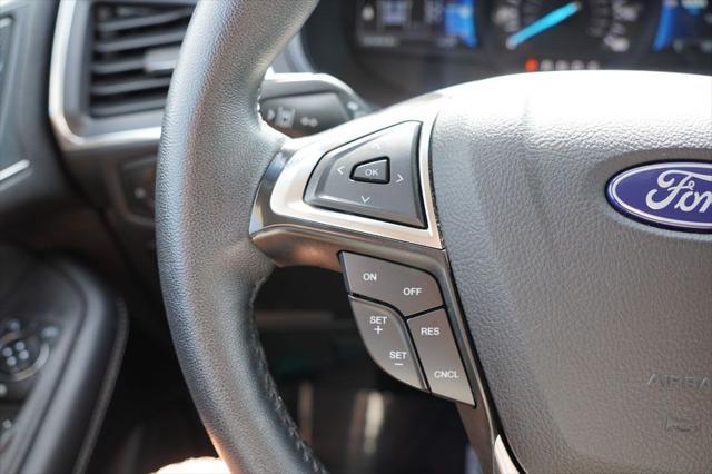 Photo of 2024 Agate Black Metallic Ford Edge