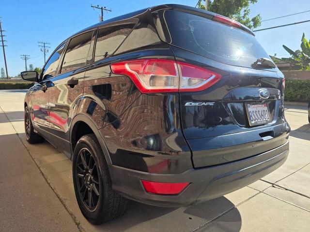 Photo of 2016 Shadow Black Ford Escape
