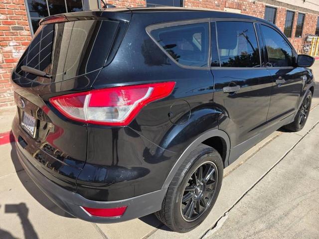 Photo of 2016 Shadow Black Ford Escape