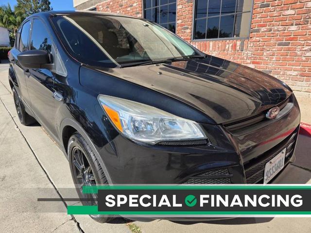 Photo of 2016 Shadow Black Ford Escape