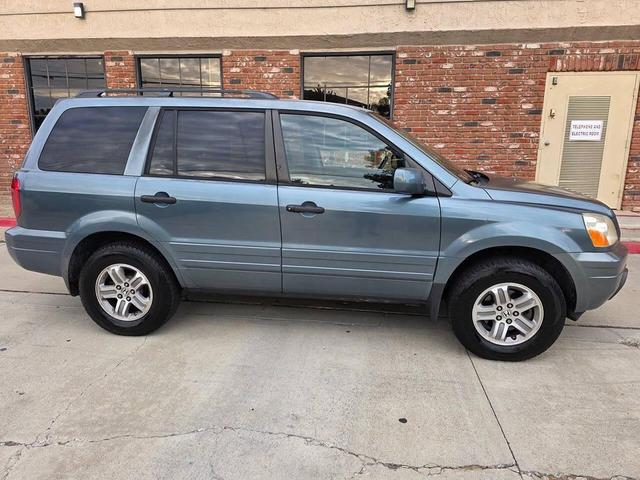 Photo of 2005 Sage Brush Pearl Honda Pilot