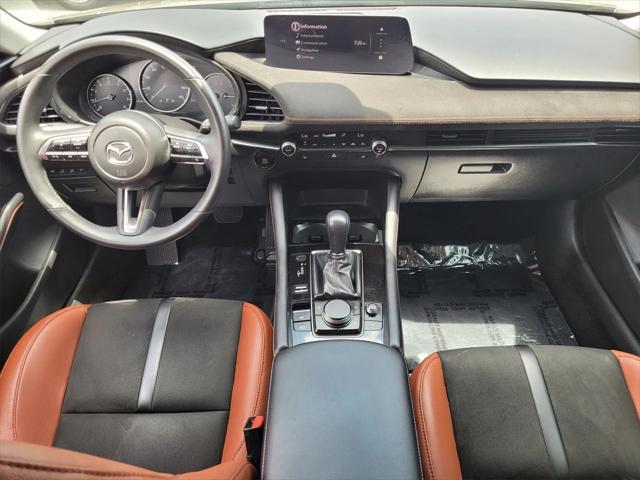 Photo of 2024 Zircon Sand Metallic Mazda Mazda3