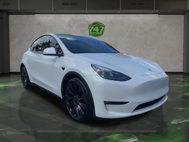 Photo of 2022 Pearl White Multi-Coat Tesla Model Y