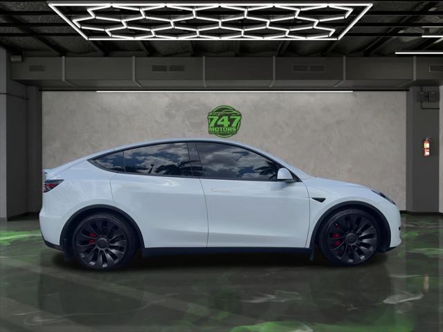 Photo of 2022 Pearl White Multi-Coat Tesla Model Y